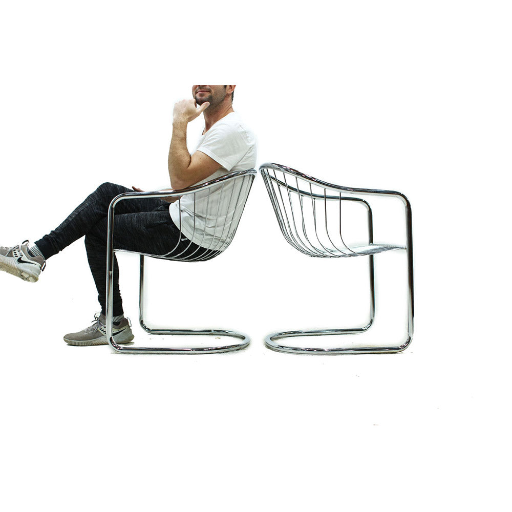 Pair of Chrome Cantilever Chairs in the style of Milo Baughman